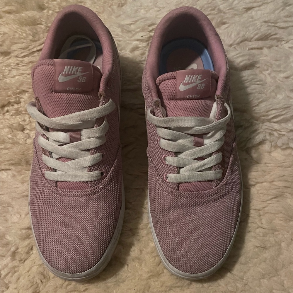 Pink Nike tennis shoes size 10